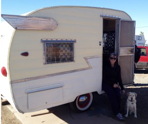 This is a picture of Baxter and me right after we purchased Junebug. I am super excited that my dream of owning a vintage camper has finally come true!