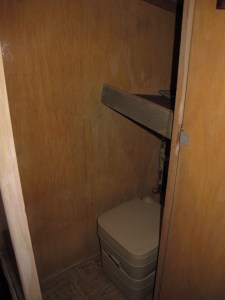 Here's the closet, which I have turned into a bathroom.  I hate the thought of using a porta potty, but in the middle of the night, I do not want to venture outside to find the public restroom or go in the woods, so I'm willing to make a compromise. 